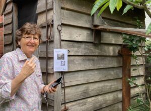 Annabel Senior listens to the 'Toilets and Taps' audio story at Miss Porter's House, made possible through a Project Development Grant in 2021. Image courtesy of Miss Porter's House.